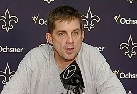 Photo shows New Orleans Saints head coach, Sean Payton, speaking with the press after the Saints 23-17 win over the Falcons.