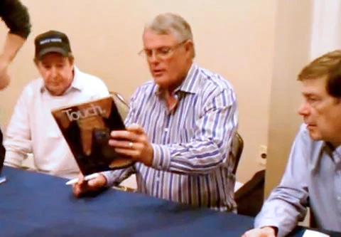 Photo shows Lou Piniella autograph signing in 2012.