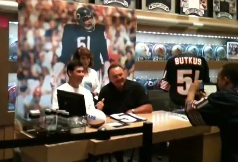 Photo shows former Bears linebacker Dick Butkus signing autographs at Caesars Palace in July 2013.